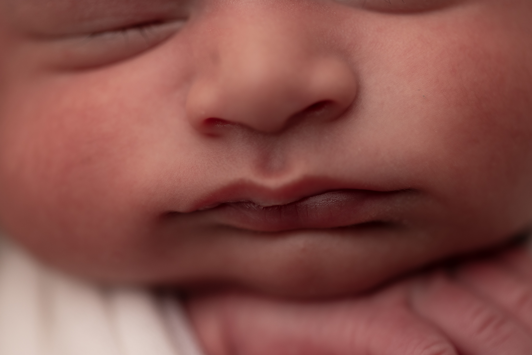 Close up of baby's face similar to an ultrasound photo