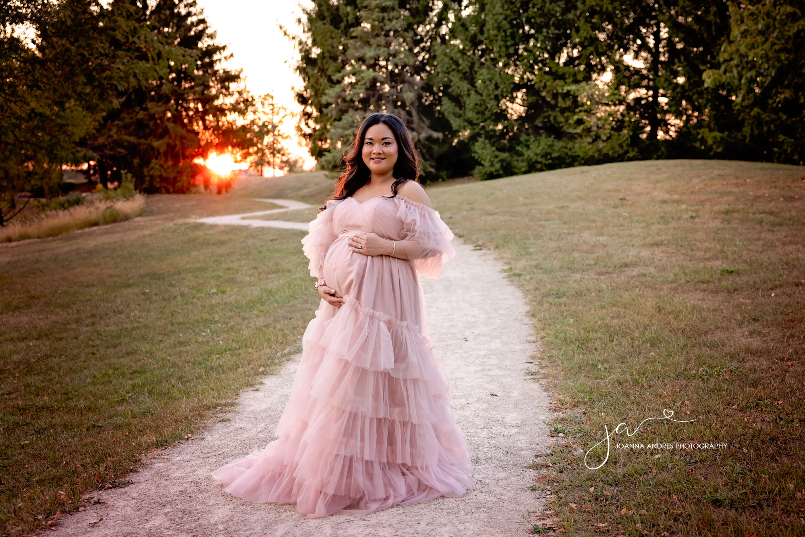 Maternity Client with sunset in backdrop