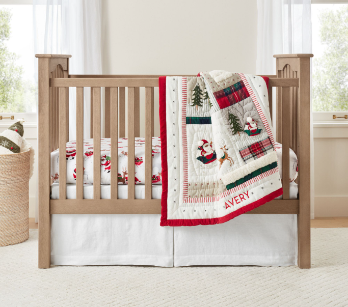 Santa themed nursery blanket and sheets from Pottery Barn Kids