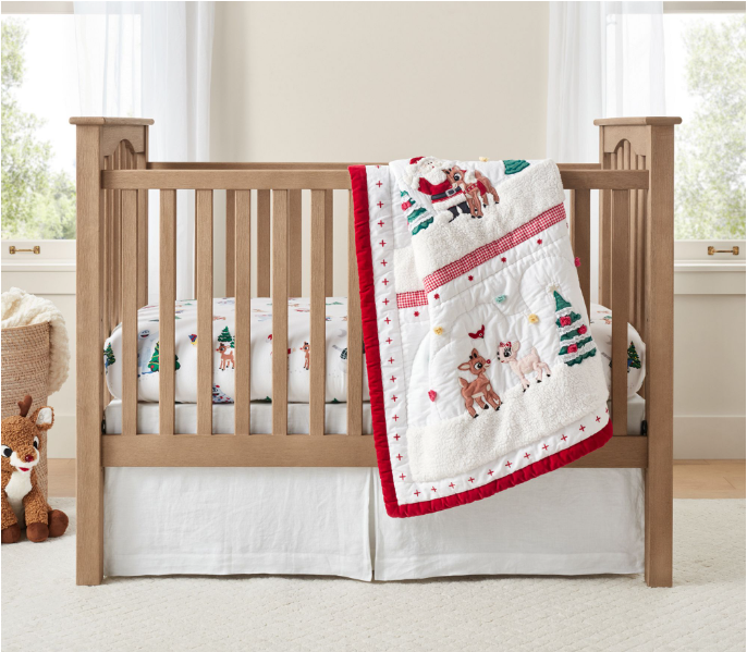 Rudolph themed nursery with Rudolph sheets and bedding