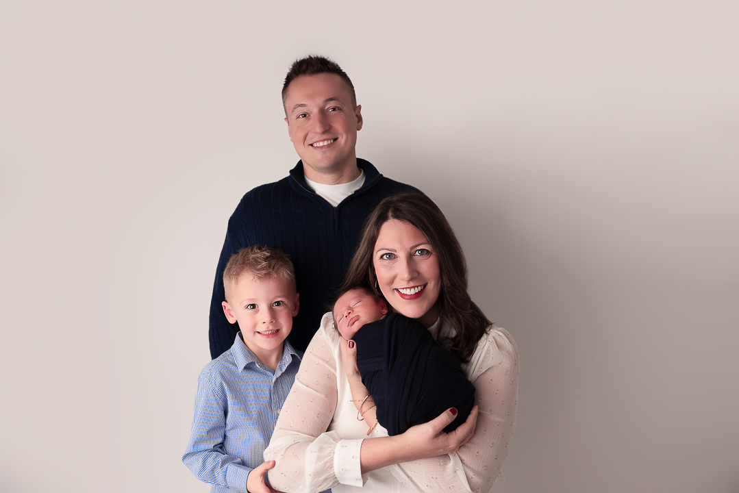 Family Portrait with Mom Holding Newborn Baby