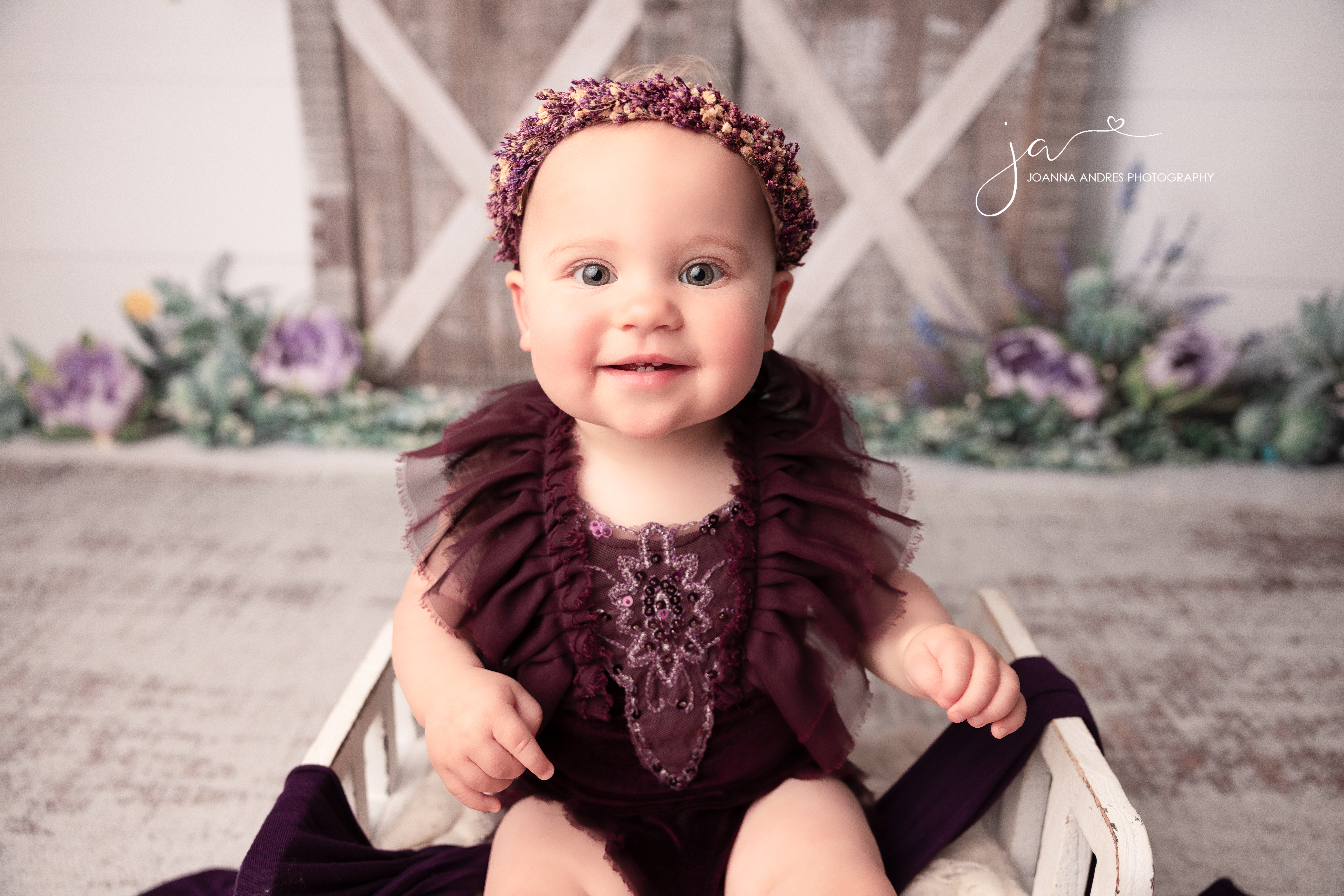 baby smiling at camera