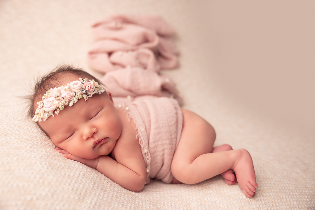 baby girl side laying pose