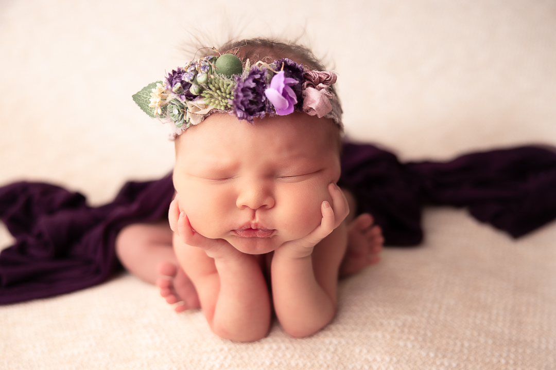 froggy pose baby girl in deep purples