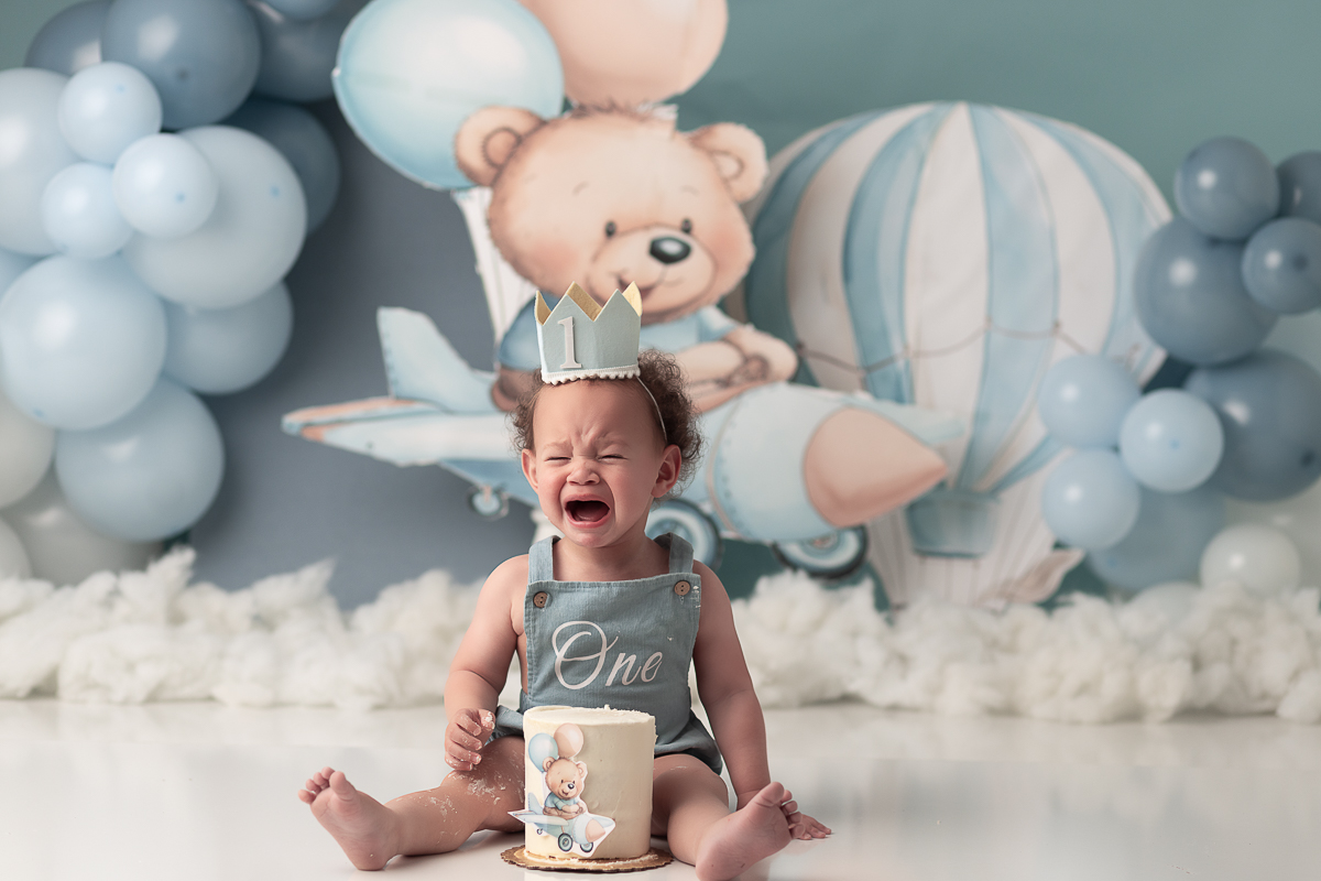 Custom gourmet ckae with an airplane photo topper for a high-end cake smash session designed by A Cake for Leroy