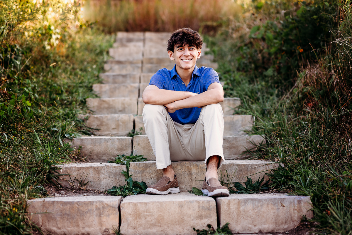 senior portrait on stone stairs