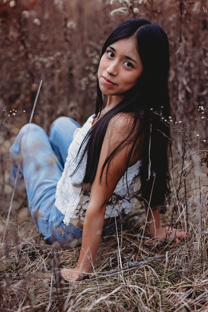Hilliard Bradley Senior Kanya Homestead Park sitting in the middle of dried wildflowers