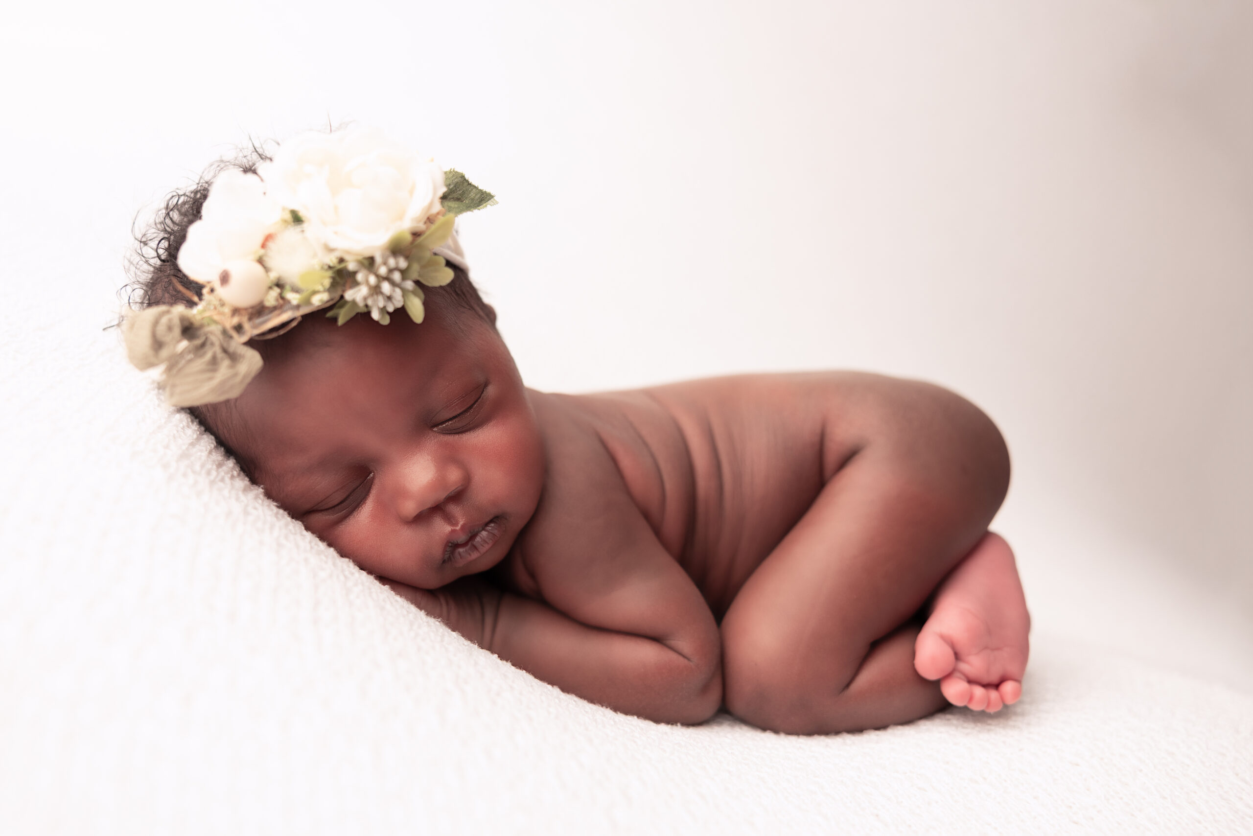 An elegant newborn session image, perfect for the trending name Sophia.