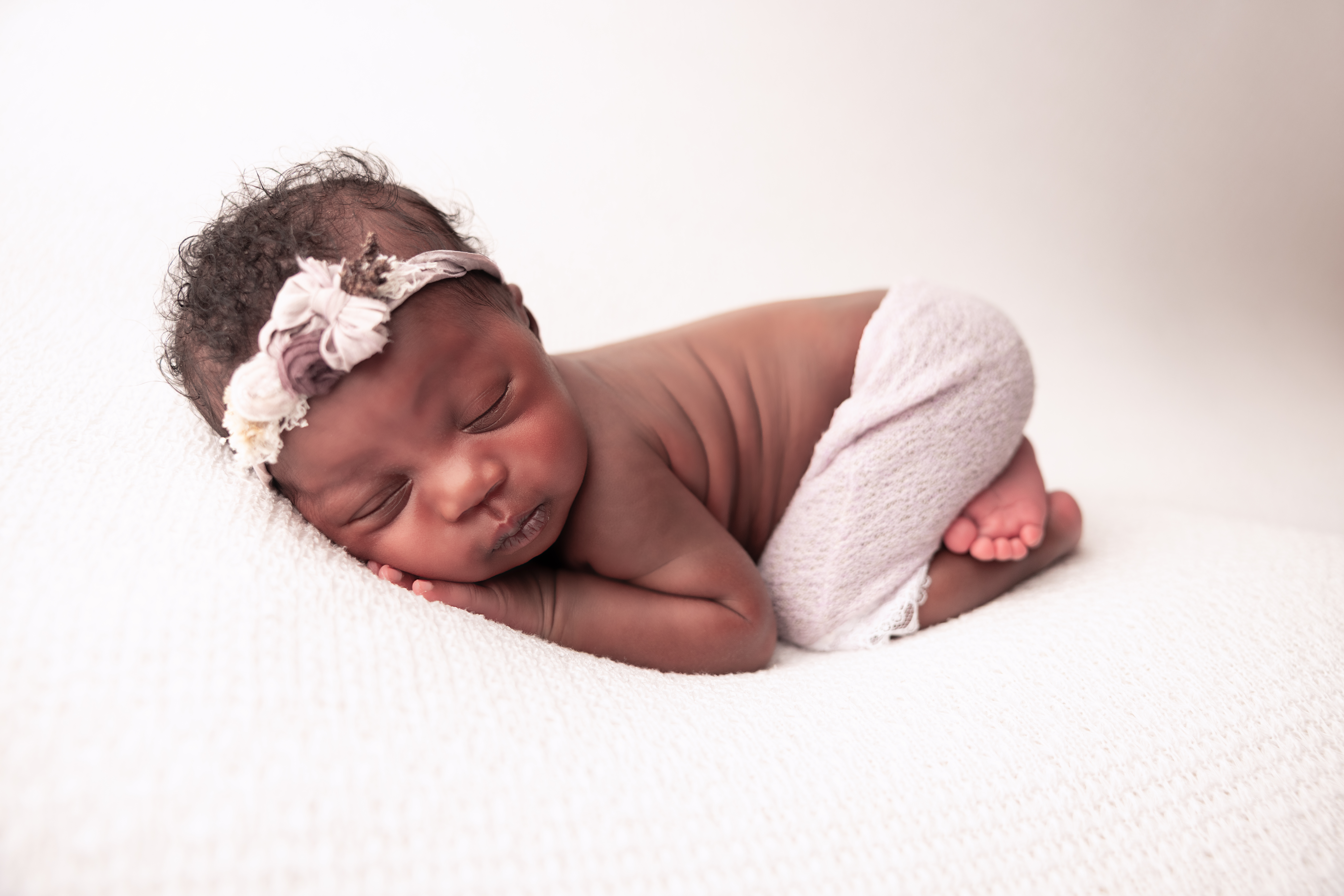 A timeless newborn photo capturing the "Grandma-chic" trend for the name Eleanor in Central Ohio.