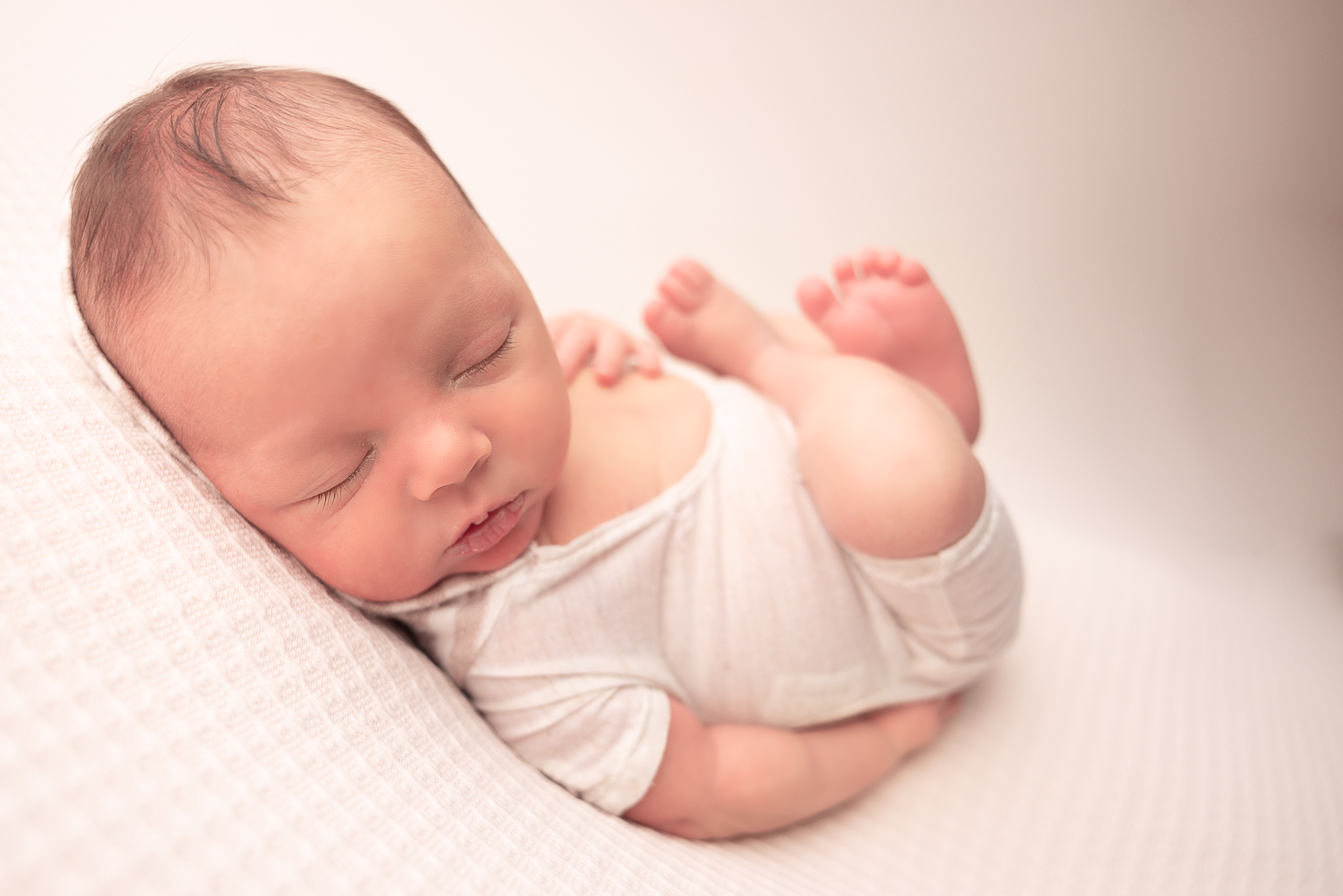 Detailed close-up of a newborn, showcasing the sophisticated style of Columbus newborn photographer