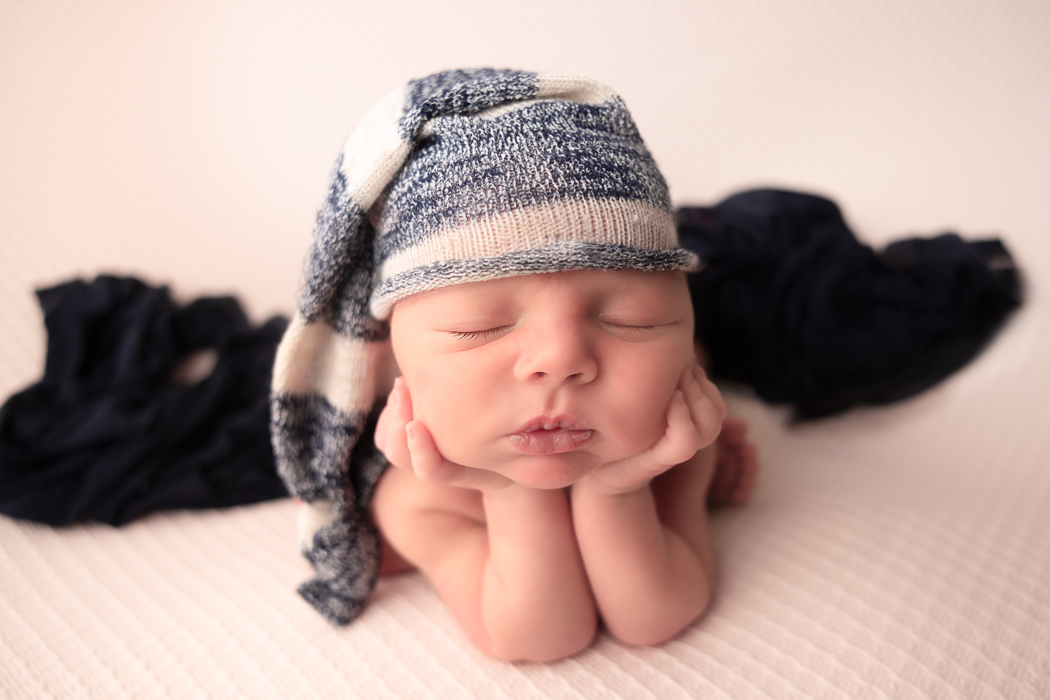 Artful newborn portrait featuring soft textures, perfect for a New Albany family’s legacy gallery